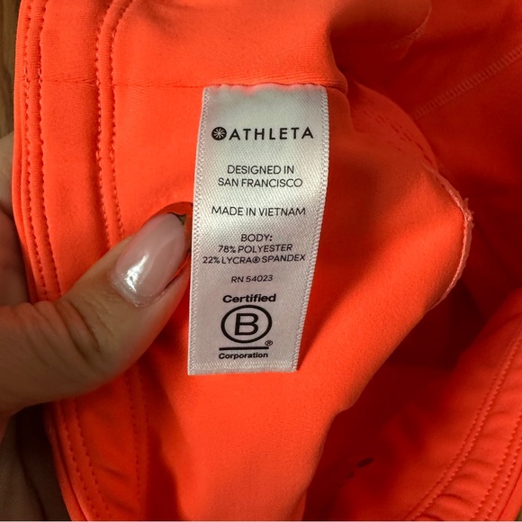 Athleta Laser-Cut High Rise Run Tight in Neon Coral | Compression Leggings Small - Picture 11 of 15